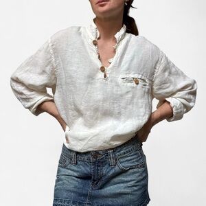 B. Loose cream linen oversized blouse